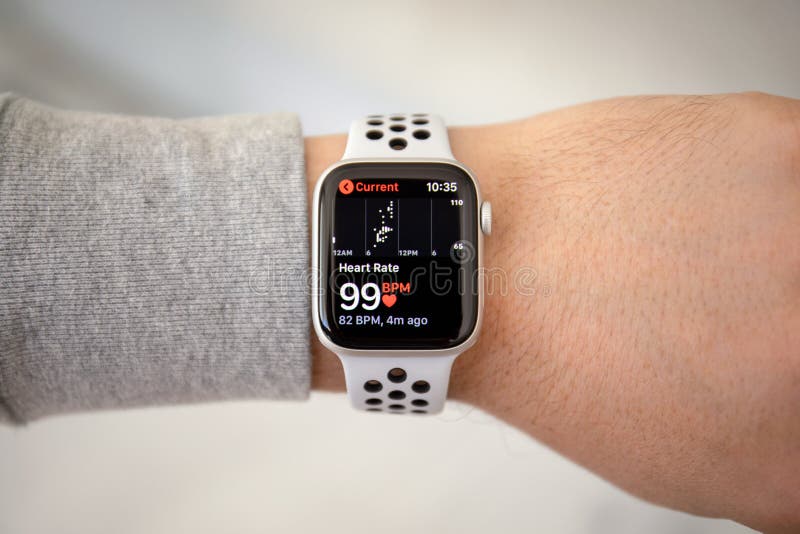 Alushta, Russia - November 6, 2018: Man hand with Apple Watch Series 4 with Heart Rate on the screen. Apple Watch was created and developed by the Apple inc.