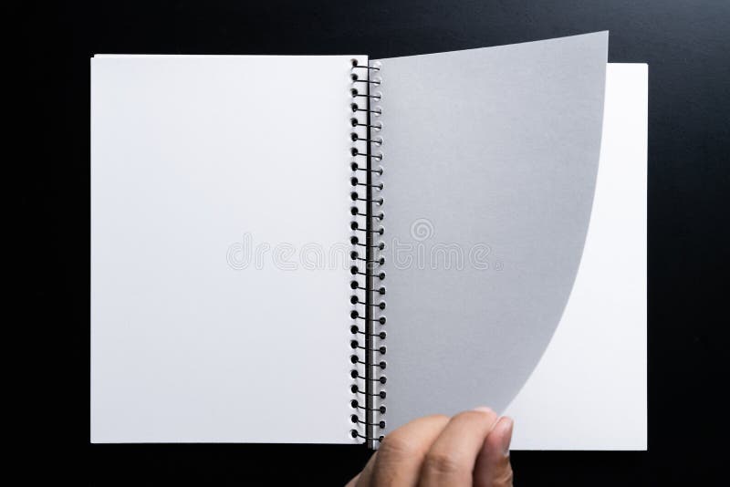 A Man Hand Holdind A Drawing Book Isolated On Black Background Stock Photo Image Of Connection Business