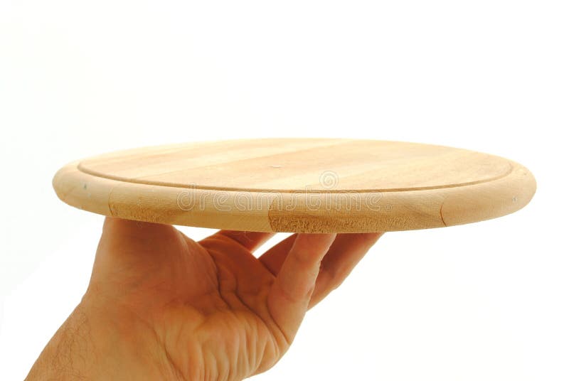 Man hand holding an empty wooden cutting board