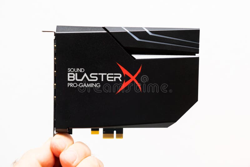 Lyon, France - Aug 9, 2019: Man hand holding new Creative Sound Blaster Hi-Resolution PCIe Gaming Sound Card and DAC with RGB Aurora Lighting System audio card isolated white background. Lyon, France - Aug 9, 2019: Man hand holding new Creative Sound Blaster Hi-Resolution PCIe Gaming Sound Card and DAC with RGB Aurora Lighting System audio card isolated white background