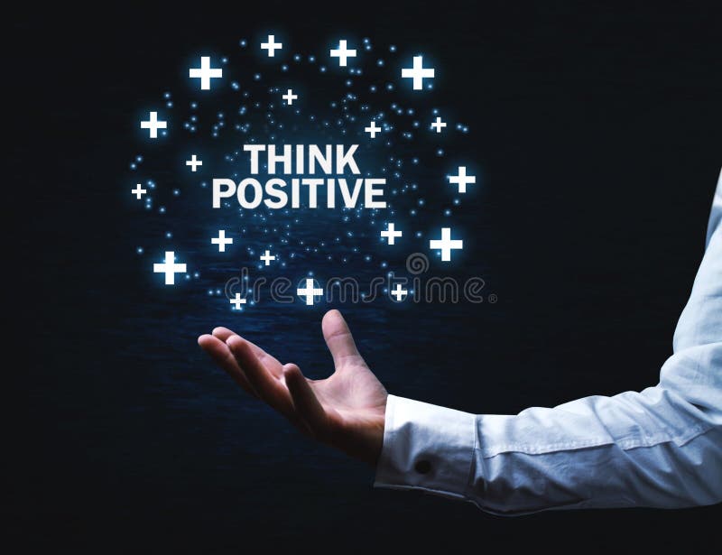 Man hand holding Think Positive words with plus signs. royalty free stock photo Man hand holding Think Positive words with plus signs. royalty free stock photo
