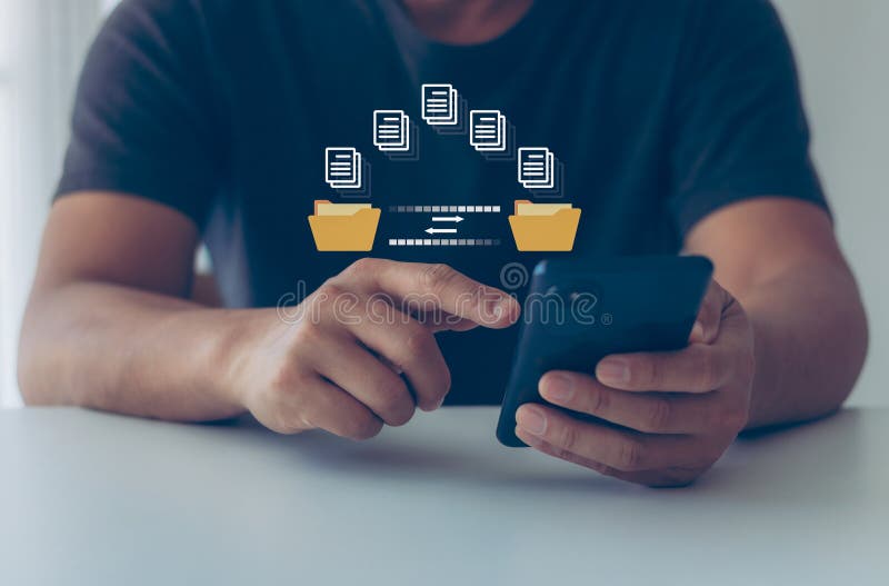 Man hand transferring files in virtual screen for Send of document on internet. Data transfer royalty free stock image