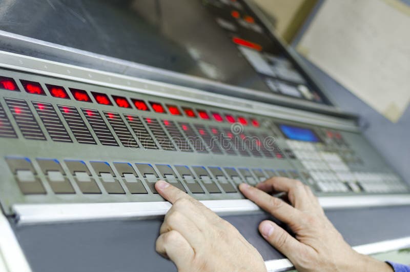 Man hand working on printing machine royalty free stock images