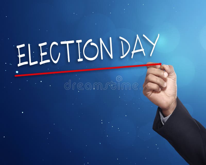 Man hand writing a  ELECTION DAY  with gold marker