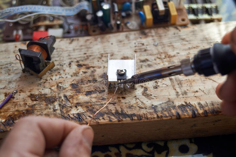 Man Hands Soldering Copper Wire with Transistor Stock Photo Image of