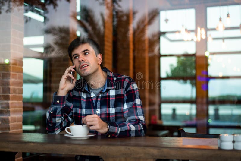 Man having coffee in the bar stock image Man having coffee in the bar stock image