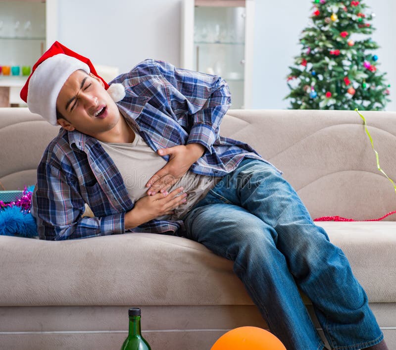 Man Having Hangover after Christmas Party Stock Photo Image of sick