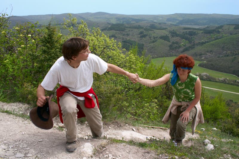 Man helping woman