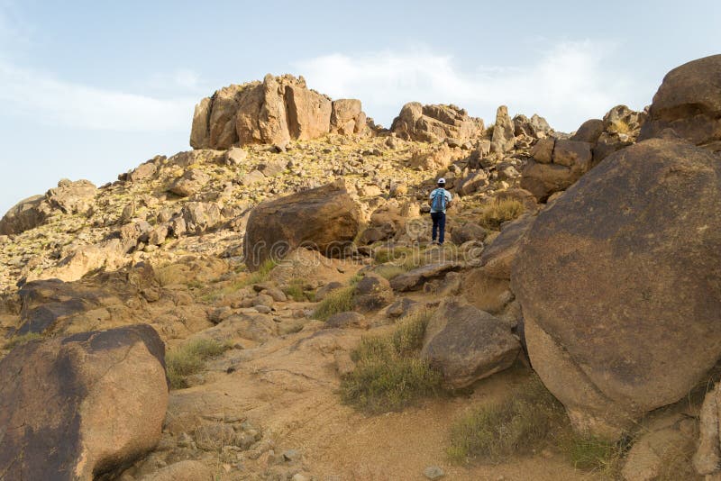 Man hiking alone in the desert royalty free stock photography Man hiking alone in the desert royalty free stock photography