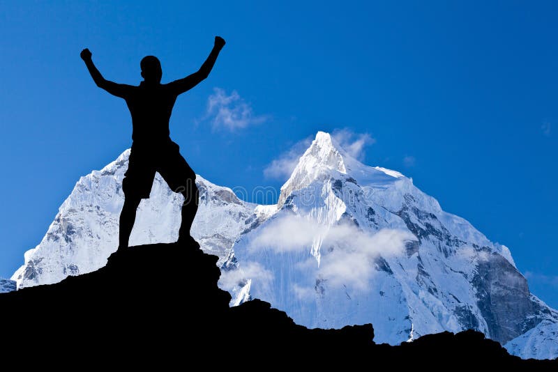 Man hiking success silhouette in mountains