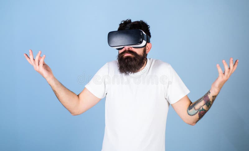 Man with hipster beard in idk posture isolated on blue background. Bearded software developer clueless about program bug stock photography Man with hipster beard in idk posture isolated on blue background. Bearded software developer clueless about program bug stock photography