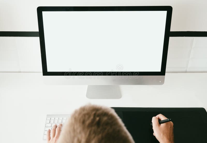 Man in his workspace with generic design computer royalty free stock images