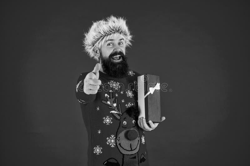 Man hold holiday shopping gift from Santa in studio. Xmas present and gift. Winter shopping sale. New Year and Christmas royalty free stock photos