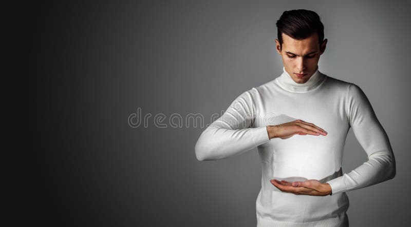 Man holding abstract glowing object stock photos