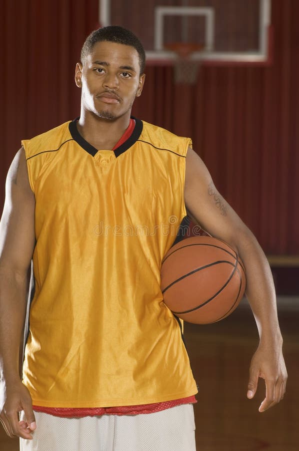 Man Holding Basketball royalty free stock photo