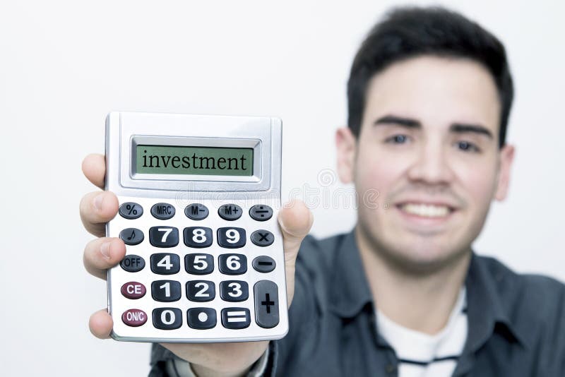 Man holding calculator stock image. Image of calculating 85805685