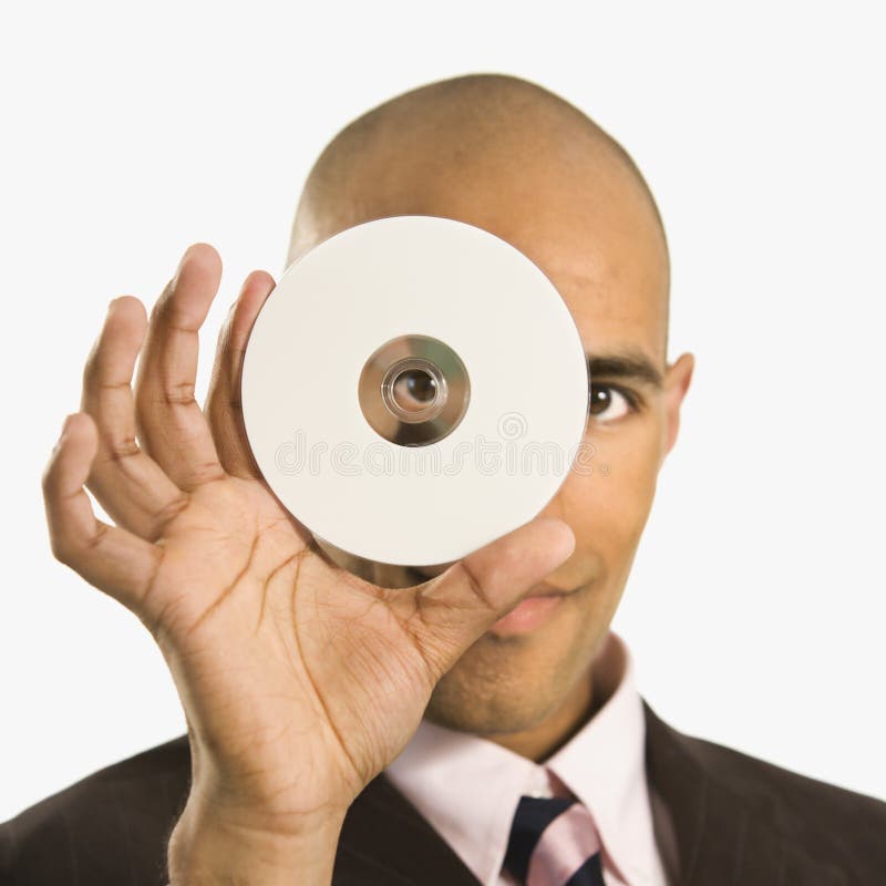 Man holding compact disc. royalty free stock images