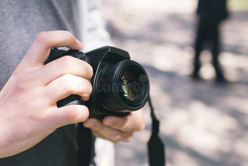 Man holding a digital photo camera royalty free stock photos Man holding a digital photo camera royalty free stock photos