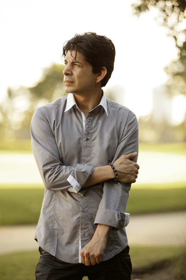 Man holding his arm stock photo. Image of natural, bright 35217374