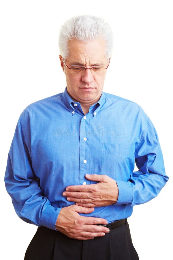 Senior citizen holding his sick belly. Spasm ache stock images, royalty-free photos and pictures