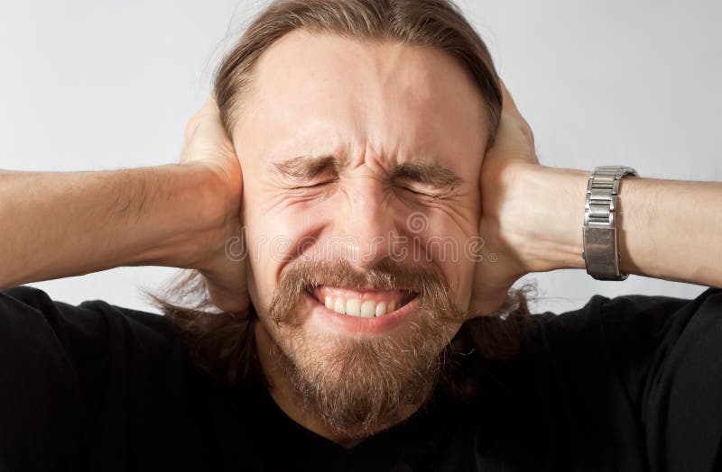 Man holding his ears stock image. Image of male, handsome 19078337