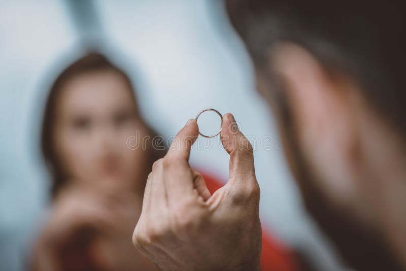 Man Holding His Wedding Ring after Divorce Stock Image Image of