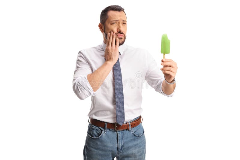 Man holding an ice cream and having a toothache stock image