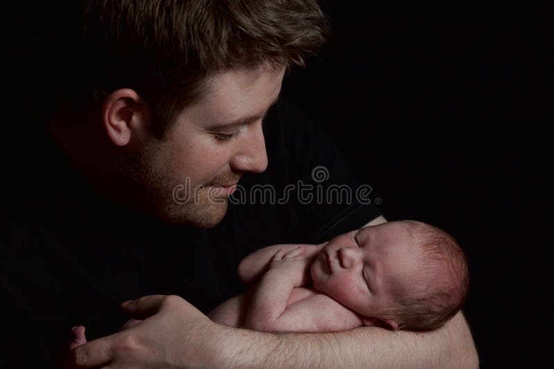 A man holding an infant