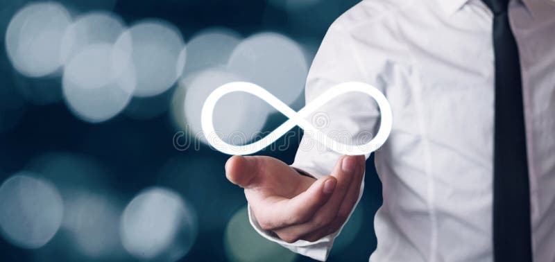 Man holding Infinity symbol. Business concept royalty free stock photos