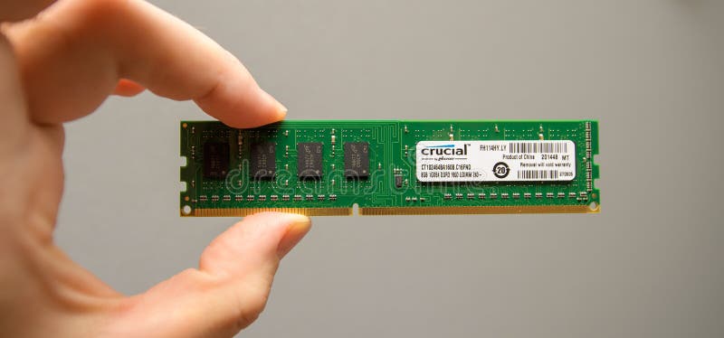 Man holding new RAM by Micron by Crucial