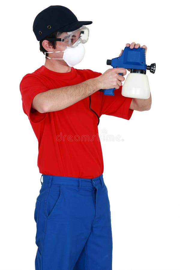 Man holding paint sprayer