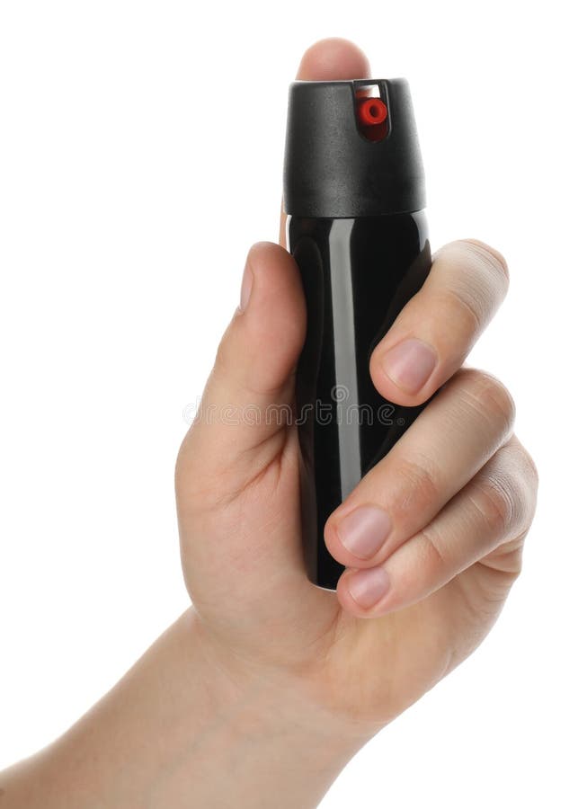 Man Holding Pepper Spray on White Background, Closeup Stock Photo