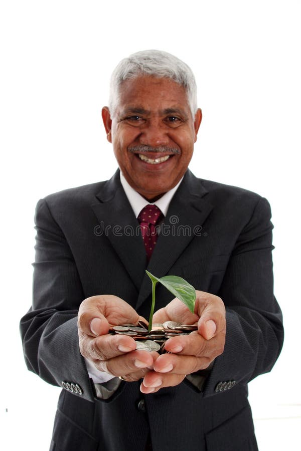 Man Holding Plant In Money