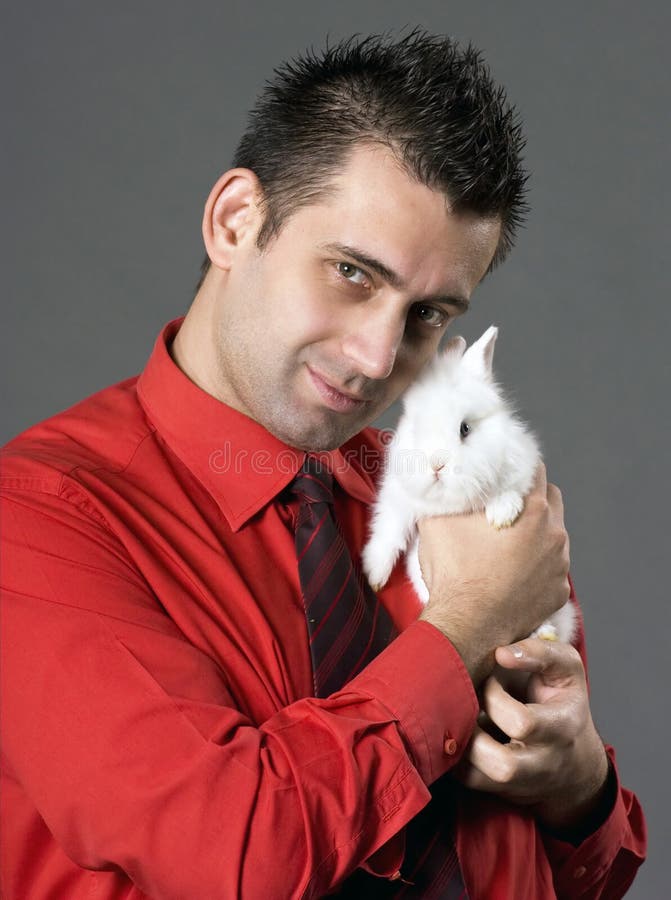 Man holding rabbit