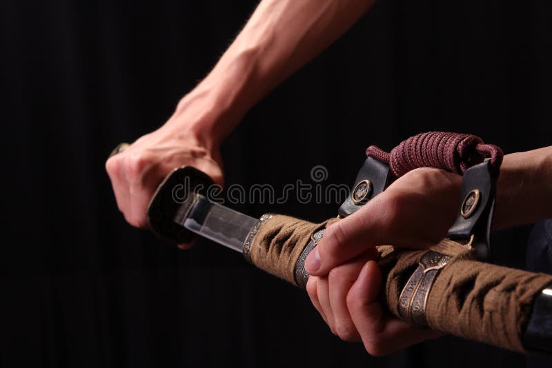 Man holding samurai sword