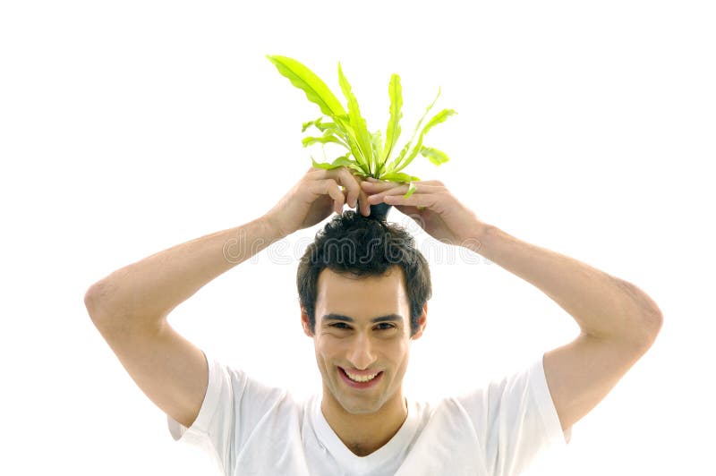 Man on holding a small plant