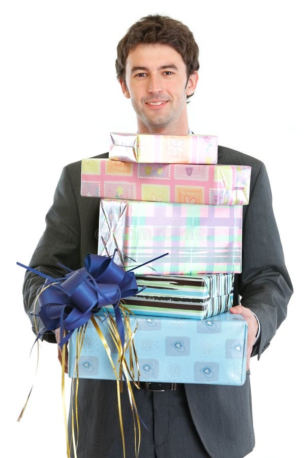 Man holding stack of gift boxes royalty free stock image Man holding stack of gift boxes royalty free stock image