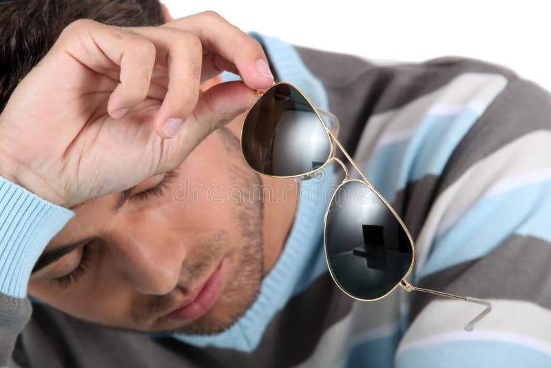 Man holding sunglasses stock photo. Image of handsome 21590600