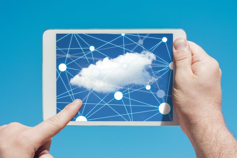 Man holding a tablet device and cloud computing communication icon to download stored data stock photography Man holding a tablet device and cloud computing communication icon to download stored data stock photography