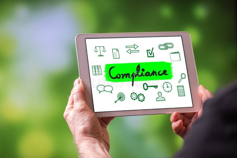 Compliance concept on a tablet stock image Compliance concept on a tablet stock image