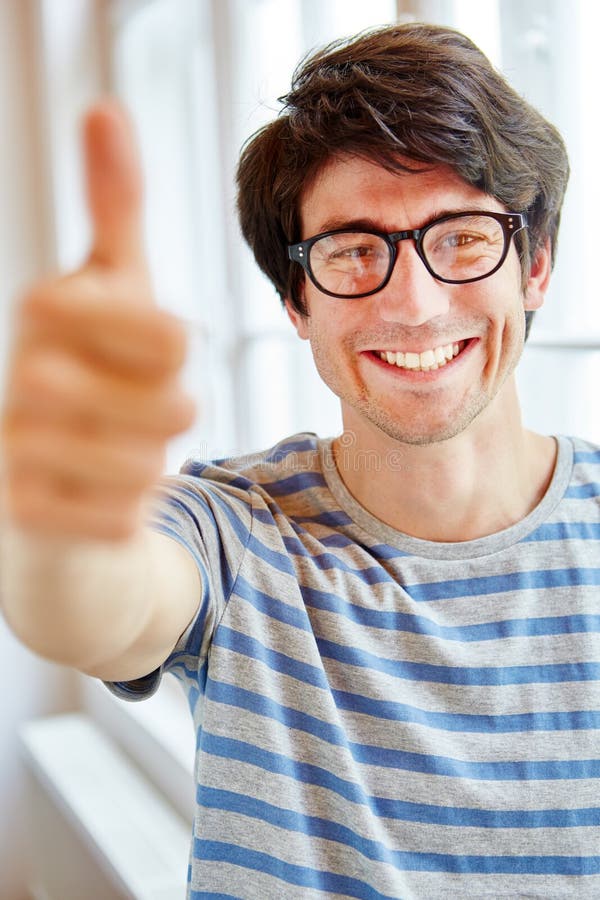 Man Start Up Holding Thumbs Up Stock Photos Free & RoyaltyFree Stock