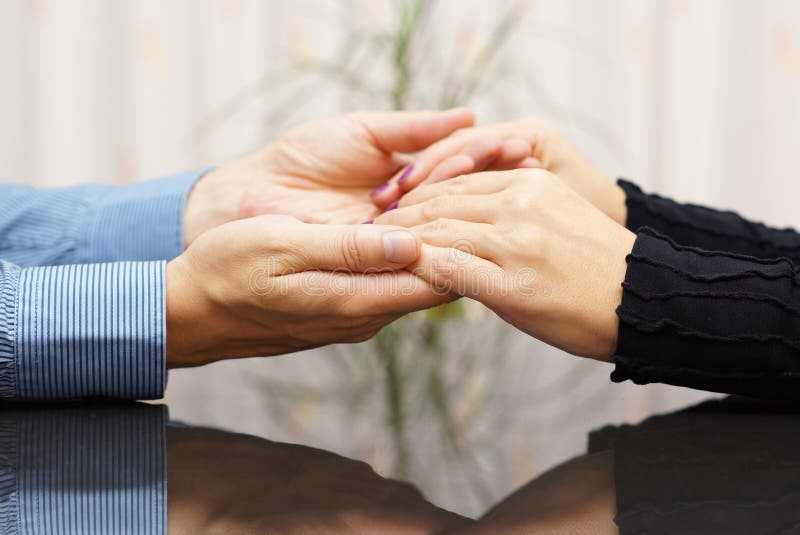 Man holding woman hands. love and care concept royalty free stock photography Man holding woman hands. love and care concept royalty free stock photography