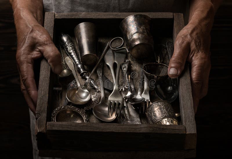 Man Holding a Wooden Box with Old Silverware Stock Image Image of