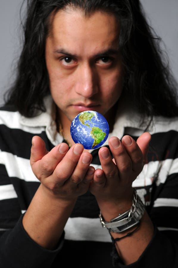 Man holding world in hands stock image. Image of harmony - 4759515