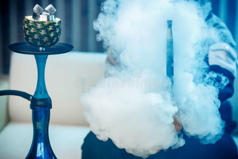 Smoke Shisha In Cocktail Glass On A Black Background. Stock Image