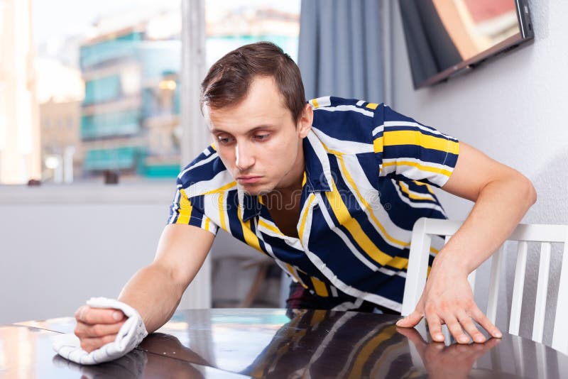 Man in home stock image. Image of sponge, caucasian - 229559961