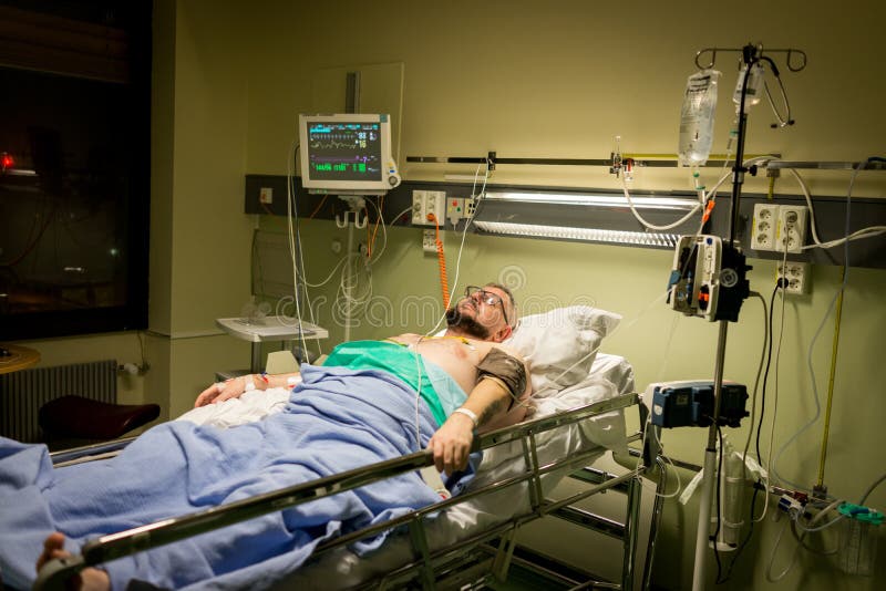 Man on hospital bed for recovery ,high quality photo