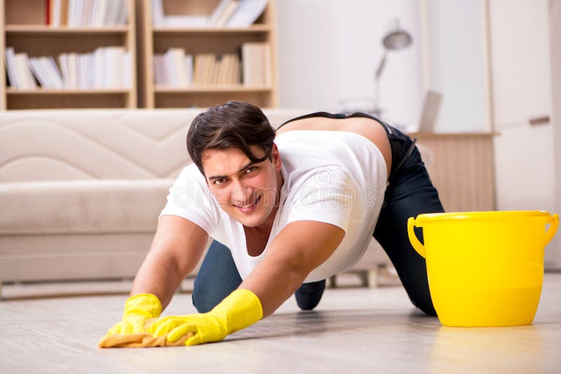 The Man Husband Cleaning the House Helping Wife Stock Im pic