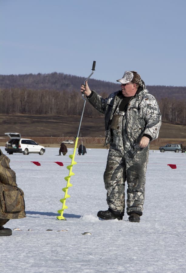 The man on the ice fishing stock photography The man on the ice fishing stock photography
