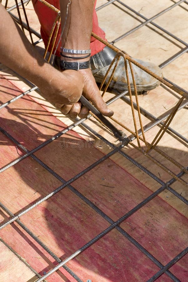 Man Installs Rebar - Vertical